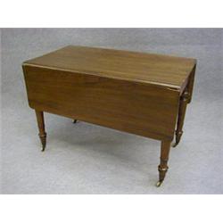 A 19TH CENTURY MAHOGANY DROP-LEAF TABLE