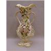 Image 1 : A TWIN HANDLED FLOWER ENCRUSTED VASE