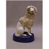 Image 1 : A STAFFORDSHIRE SEATED POODLE