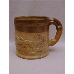 A 19TH CENTURY SALT-GLAZED STONEWARE MUG