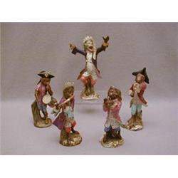 A SERIES OF FIVE MONKEY BAND FIGURES