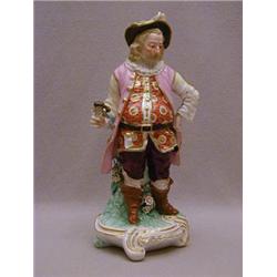 A 19TH CENTURY PORCELAIN FIGURE