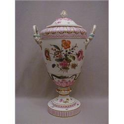 A EUROPEAN TWIN HANDLED BALUSTER VASE and cover