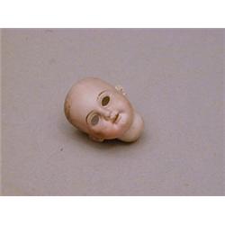 AN ARMAND MARSEILLE DOLL'S BISQUE HEAD
