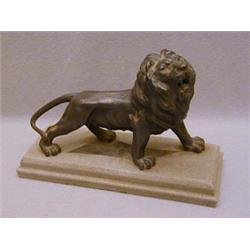 A SPELTER FIGURE OF A ROARING LION