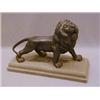 Image 1 : A SPELTER FIGURE OF A ROARING LION