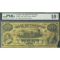 The Bank of Toronto 1923 $20 #146742 CH-715-22-60. PMG VG10 Net. Bottom right hand corner missing an