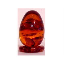 Decorative Arts: Amber Egg The solid amber eg