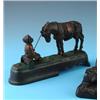 Image 1 : ALWAYS DID' SPISE A MULE': AN AMERICAN CAST IRON MONEY BANK, late nineteenth century, in the form o