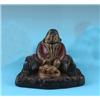 Image 1 : A LATE NINETEENTH CENTURY CAST IRON INKWELL, in the form of a rotund man seated and carving a turkey