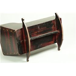 DECORATED DOLL CRADLE.