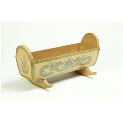 DECORATED DOLL CRADLE.