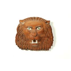 CARVED LION PLAQUE.