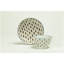 HANDLELESS CUP AND SAUCER.