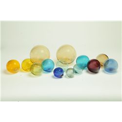 FOURTEEN GLASS FLOAT BALLS.