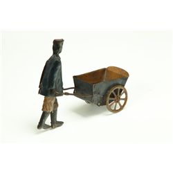 TIN WIND UP TOY.