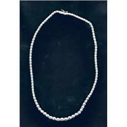 Beautiful Sterling Silver R Graduated CZ necklace.