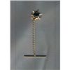 Image 1 : Golden Tie Tack  Starlike design with a black stone in the center.  1 1/2" chain with bar. Vintage