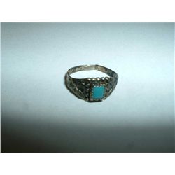Antique silver and turquoise ring Marked Sterling.  1.1 grams