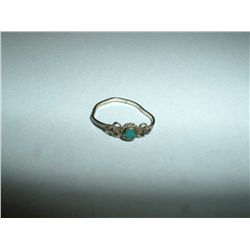 Antique silver and turquoise ring Marked .925.  0.5 grams