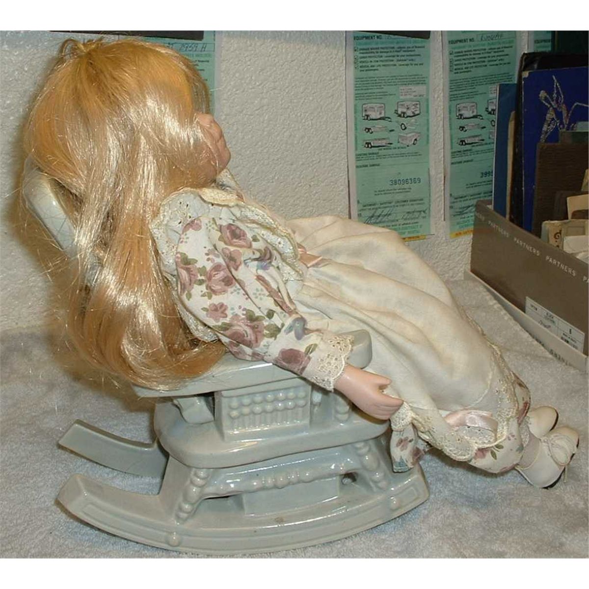 Vintage baby doll Ceramic head, hands and legs. Sitting in ceramic