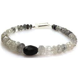 Natural Black Rutile Faceted Onion Shape Graduated Briolettes Bracelet with Faceted Onyx at the Cent