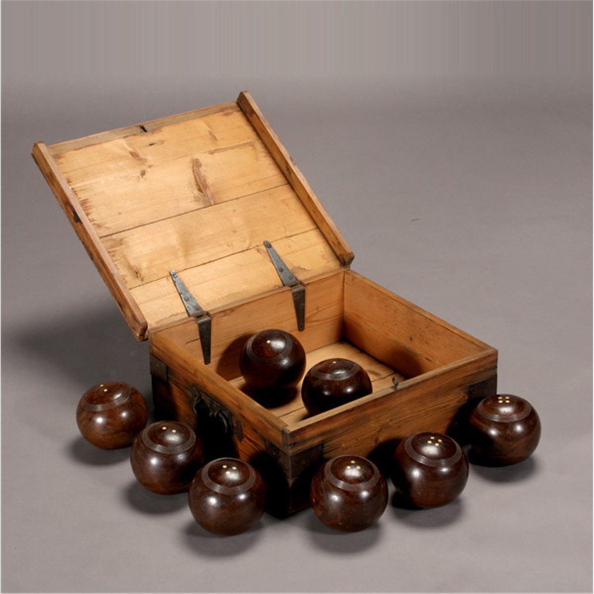 Cased Set of Eight Lignum Vitae Lawn Bowling Balls