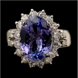 TANZANITE, DIAMOND, 14K WHITE GOLD RING.