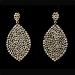 PAIR OF DIAMOND, STERLING SILVER, 18K Y/G EARRINGS.