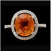 Image 1 : GARNET, DIAMOND, 18K WHITE GOLD RING.