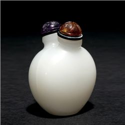 A Pair of White Jade Snuff Bottles