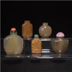 A Group of Five Stone Snuff Bottles