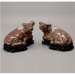 A Pair of Glazed Recumbent Water Buffalo, Late Qing