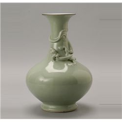 A Celadon-Glazed Porcelain Dragon Vase, Qing