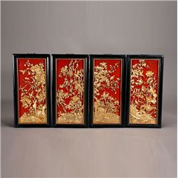 Four Red-Lacquered and Gilt-Painted Wood Panels