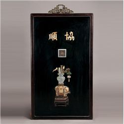 A Large Embellished and Lacquered-Wood Wall Panel*