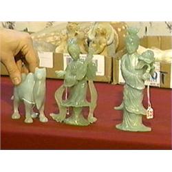 Three older, Chinese carved bowenite pieces: beauty with lute, Kwan Yin with flower and Bactrian cam