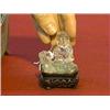 Image 1 : Small and old, Chinese clear rock crystal figure of a seated Immortal holding a peach, circa 1900, w