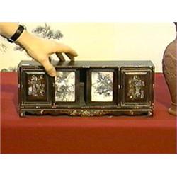 Small and antique, Chinese chest with well-detailed mother-of-pearl inlaid dragon amid clouds and sc