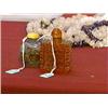 Image 1 : Two Chinese snuff bottles: well-hollowed "cameo" agate with pomegranate design, ivory stopper; and a