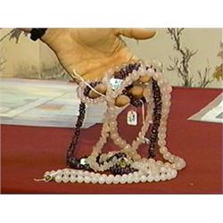 Group of four bead necklaces: three rosequartz and one amethyst