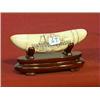 Image 1 : Well-detailed, scrimmed whale's tooth with sailing ship design, inscriptions, wood stand