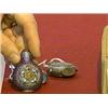 Image 1 : Three old snuff bottles: two Chinese cloisonné and enameled; and a Mongolian "jeweled" repousse silv