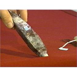 Chinese carved, "calcified" jade or hardstone object in the form of an archaistic spear-like point o