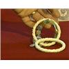 Image 1 : Three Chinese carved bracelets: pair of ivory with "twist" designs; and a multi-colored jadeite "swa