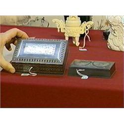 Two Indian, silver inlaid boxes: smaller with stylized florals on cover and large with all over flor