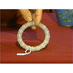 Well-carved and polished greyish-white jade bangle bracelet