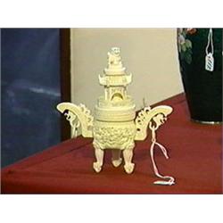 Small and very well-detailed, Chinese carved ivory tripod koro of somewhat architectural form with e