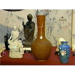 Tall and well-detailed, old Japanese red pottery long-necked vase with moulded dragon amid cloud and