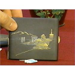 Group of three, old Japanese black-ground 24K gold and silver damascene inlaid cases: two cigarette 